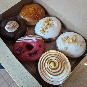Doce Donut Co - Passion fruit creme brulee, guava con queso, key lime, raspberry white chocolate, Mexican chocolate - Donuts Near Me - Seattle, Washington Doce Donut Co - Passion fruit creme brulee, guava con queso, key lime, raspberry white chocolate, Mexican chocolate - Donuts Near Me - Seattle, Washington