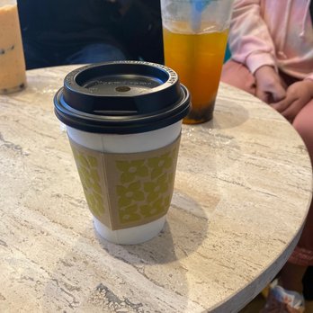 Sweetland - Caramel latte, and mango green tea with tapioca - Coffee & Tea Near Me - Humble, Texas Sweetland - Caramel latte, and mango green tea with tapioca - Coffee & Tea Near Me - Humble, Texas