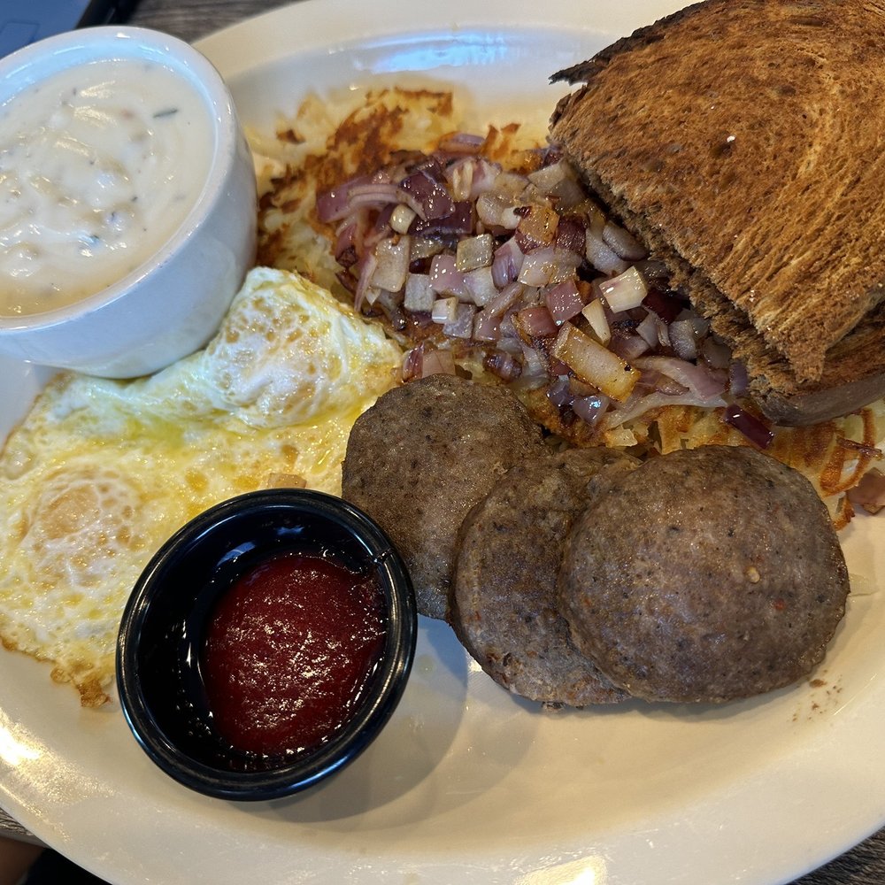Biscuits Cafe - Sausage patties, taste like alternative meat we added onions to the hashbrowns, but still no flavor besides oil. Horrible country gravy - Breakfast & Brunch Near Me - Milwaukie, Oregon