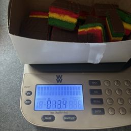 13.4 oz for the cookies and box. Not 1lb.