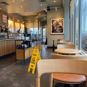 Starbucks - a coffee shop with a caution sign in the foreground - Coffee & Tea Near Me - Blasdell, New York Starbucks - a coffee shop with a caution sign in the foreground - Coffee & Tea Near Me - Blasdell, New York