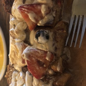 The Root Cellar Cafe - Brazilian French toast with whip cream and berries. - Breakfast & Brunch Near Me - San Marcos, Texas