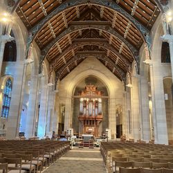 Sacred Heart Cathedral - Front of the church featuring the sanctuary and pipe organ in the apse with 16 angel adorned pillars.