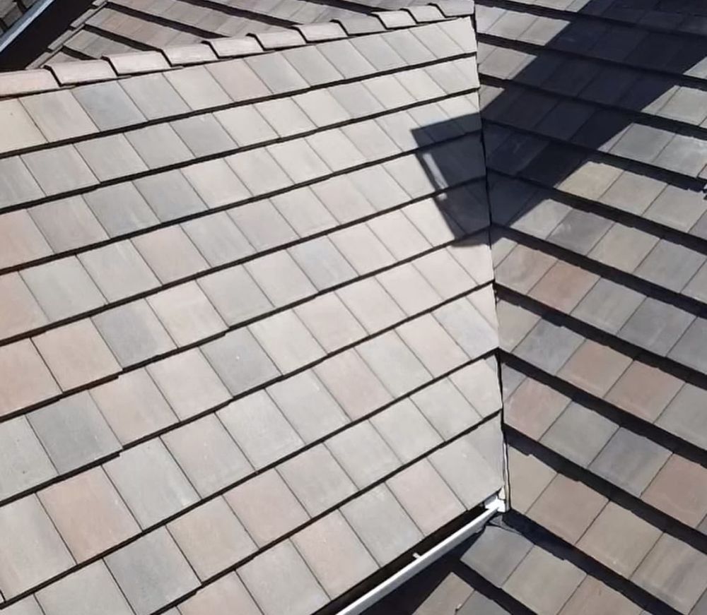 Slide of Exclusively Roofing