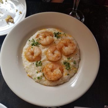 Charlies Bar & Kitchen - The infamous Shrimp & Grits, with cheddar cheese (minus the chorizo). - Cocktail Bars Near Me - Bronx, New York Charlies Bar & Kitchen - The infamous Shrimp & Grits, with cheddar cheese (minus the chorizo). - Cocktail Bars Near Me - Bronx, New York