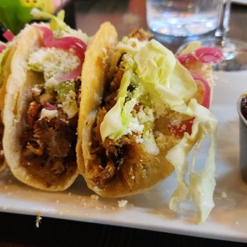 Original Gravity - Carnitas with different hot sauces - New American Near Me - Phoenix, Arizona