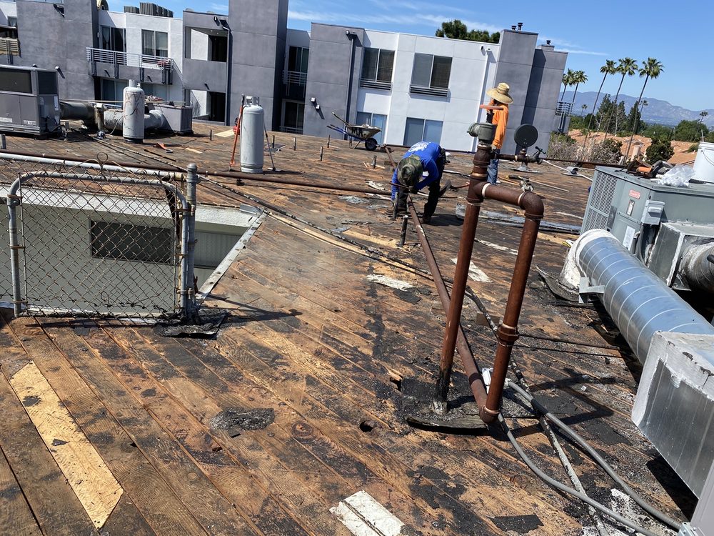 Slide of MA Rain Gutters