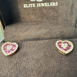 Elite Jewelers - (Left earring somewhat rose gold and right yellow gold)