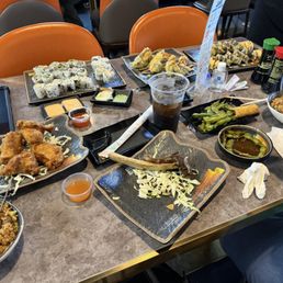 Crust chicken wings, fried rice, beef short rib, jalapeño poppers, spicy yellowtail roll, Las Vegas roll, spicy garlic edamame