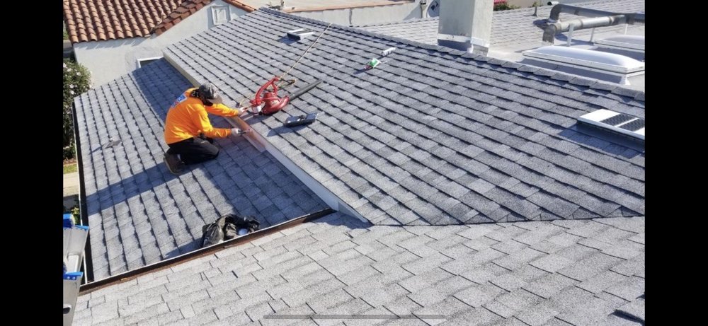 Slide of Rex Roofing