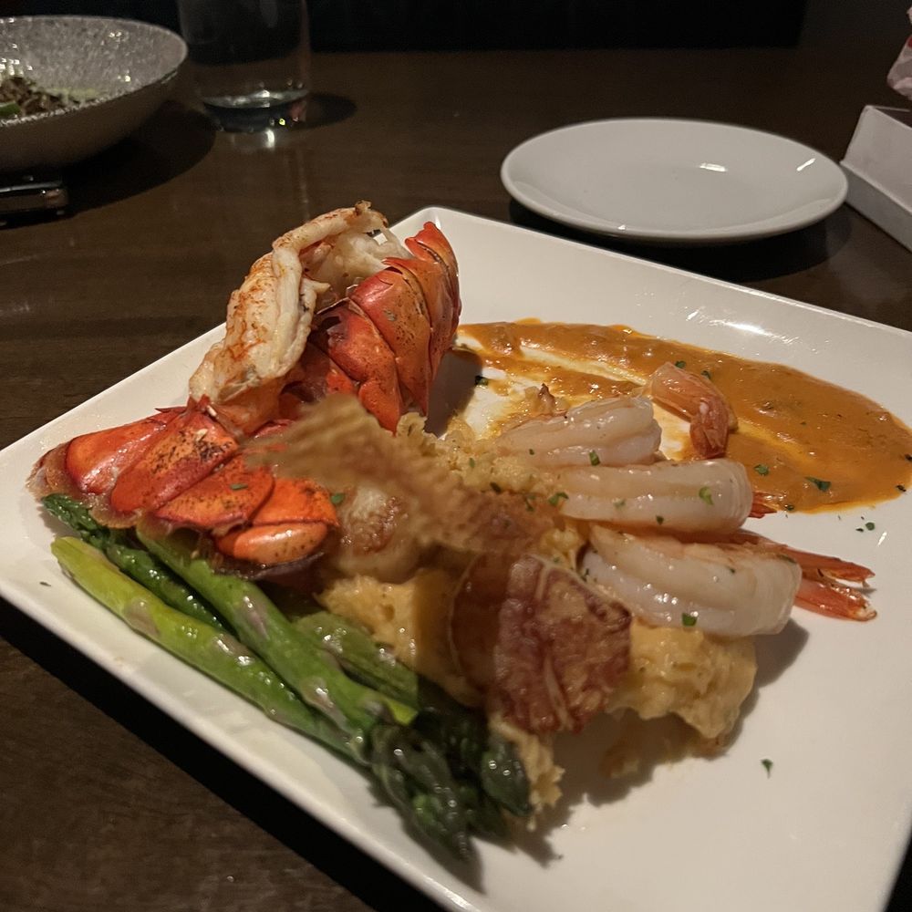 Lobster tail, scallops, shrimp, asparagus & lobster mashed potatoes. Lobster tail, scallops, shrimp, asparagus & lobster mashed potatoes.