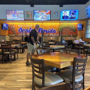 Hooters - No mask - Sports Bars Near Me - Ocala, Florida