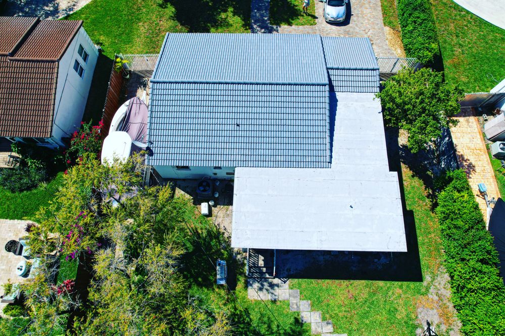 Slide of Nacs Roofing