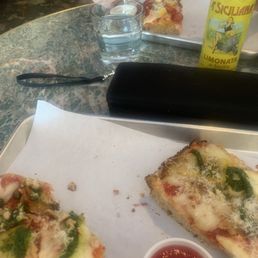 Eggplant Parmesan pizza and pepperoni pizza