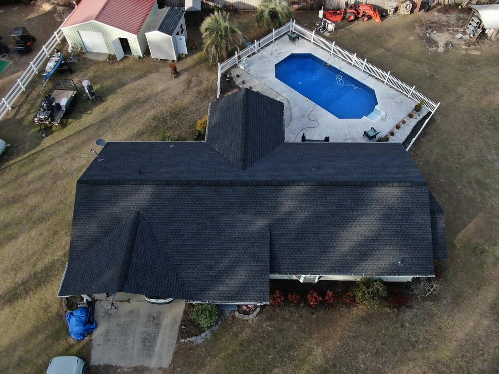 Slide of JMR Roofing