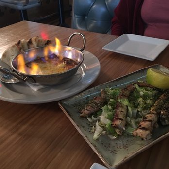 Stella's - Flaming cheese and grilled squid - Greek Near Me - Charleston, South Carolina Stella's - Flaming cheese and grilled squid - Greek Near Me - Charleston, South Carolina