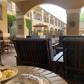 Ayres Hotel - Eating breakfast outside. So calming. - Hotels Near Me - Redlands, California
