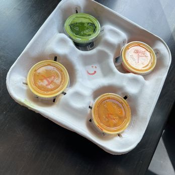 Fitrition - a tray with four cups of juice - Juice Bars & Smoothies Near Me - Melville, New York