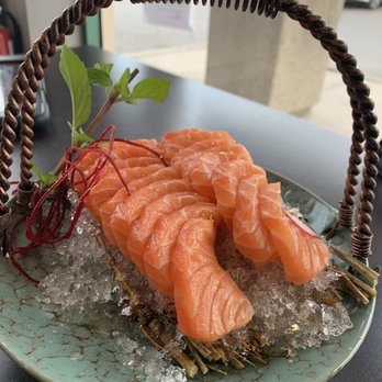 Torii Sushi - Salmon sashimi in a bed of ice - Sushi Bars Near Me - Aurora, Ontario Torii Sushi - Salmon sashimi in a bed of ice - Sushi Bars Near Me - Aurora, Ontario