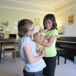 Acoustic Ventures Music Studio - Mr. McCuddles kitty-cat helps kids settle in to studies. Photo courtesy of Rina T.