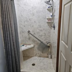 Wells Marble Co - Our shower with handicap grab bars added later that year after a long hospital stay.