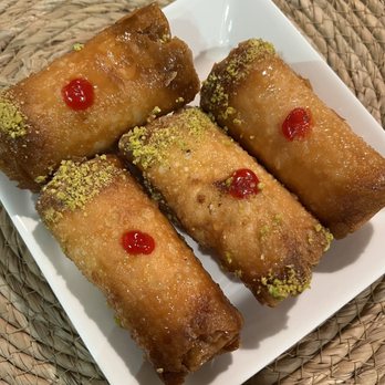 Sarkis Pastry - I don't know the name of this pastry, but it's got some type of clotted cream filling and sweet syrup finish. - Bakeries Near Me - Pasadena, California Sarkis Pastry - I don't know the name of this pastry, but it's got some type of clotted cream filling and sweet syrup finish. - Bakeries Near Me - Pasadena, California