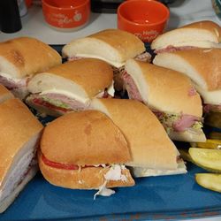 Tops Markets - Mix of fresh subs, Turkey, Roast Beef, Ham, and Italian.