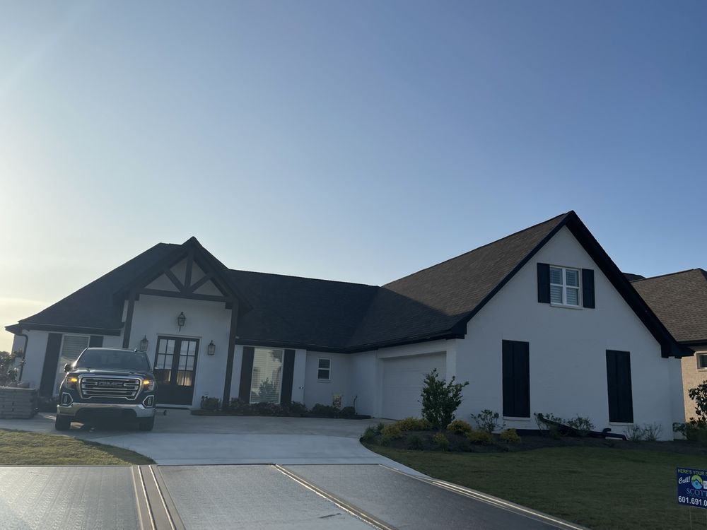 Slide of Scott Roofing