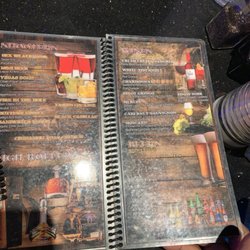 The menu and my burrito with appetizers and dessert.