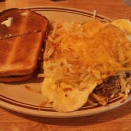 Stuffed hash browns with rye toast. Great for a hang over. Stuffed hash browns with rye toast. Great for a hang over.