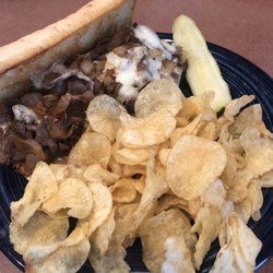 Pourman's Pub & Grill - Philly sandwich and chips galore! Yumm!