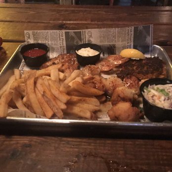 Red's Ice House - Combo with fish, hushpuppies, grilled shrimp , grilled scallops and a crabcake - Seafood Near Me - Mount Pleasant, South Carolina Red's Ice House - Combo with fish, hushpuppies, grilled shrimp , grilled scallops and a crabcake - Seafood Near Me - Mount Pleasant, South Carolina