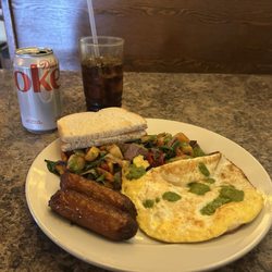 Badger Creek Cafe - Today's Special: Sirloin Steak & Root Vegetable Hash, Over-Hard Eggs with chimichurri, sourdough bread  Side of sausage links  Diet Coke