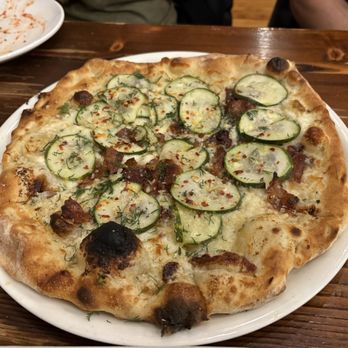 Peel Wood Fired Pizza - Bacon & Pickle pizza - Pizza Near Me - O'Fallon, Illinois Peel Wood Fired Pizza - Bacon & Pickle pizza - Pizza Near Me - O'Fallon, Illinois