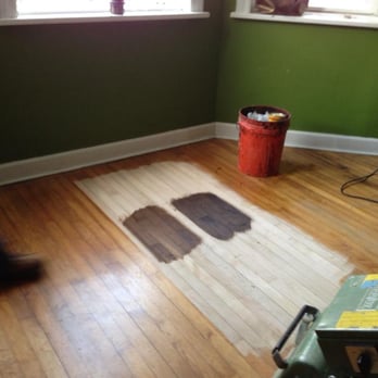 Rovin's Hardwood Flooring - showing us some stain options (you can see how bad the old floor was) - Flooring Near Me - Chicago, Illinois Rovin's Hardwood Flooring - showing us some stain options (you can see how bad the old floor was) - Flooring Near Me - Chicago, Illinois