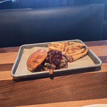 BJ's Restaurant & Brewhouse - Brisket and Bacon Burger with Fries - American Near Me - Greenwood, Indiana