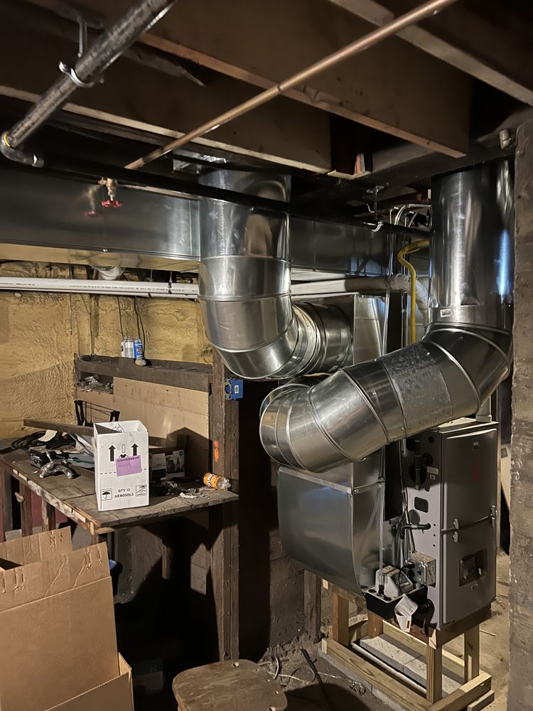 Slide of Wollman Heating and Plumbing