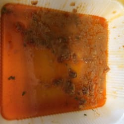 Kickin Wings - After I had to reheat my wings this is what was left in the take-out container