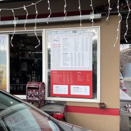 a car parked in front of a restaurant