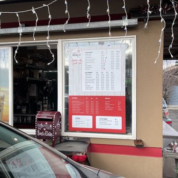 The Roost - a car parked in front of a restaurant - Coffee & Tea Near Me - Reno, Nevada