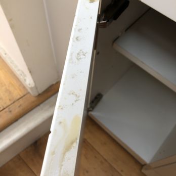 Cleaners London - Top of kitchen cupboard doors left uncleaned - Home Cleaning Near Me
