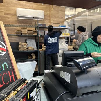Bangin’ Fish & Chicken - Workers getting orders together - Chicken Wings Near Me - Catonsville, Maryland Bangin’ Fish & Chicken - Workers getting orders together - Chicken Wings Near Me - Catonsville, Maryland