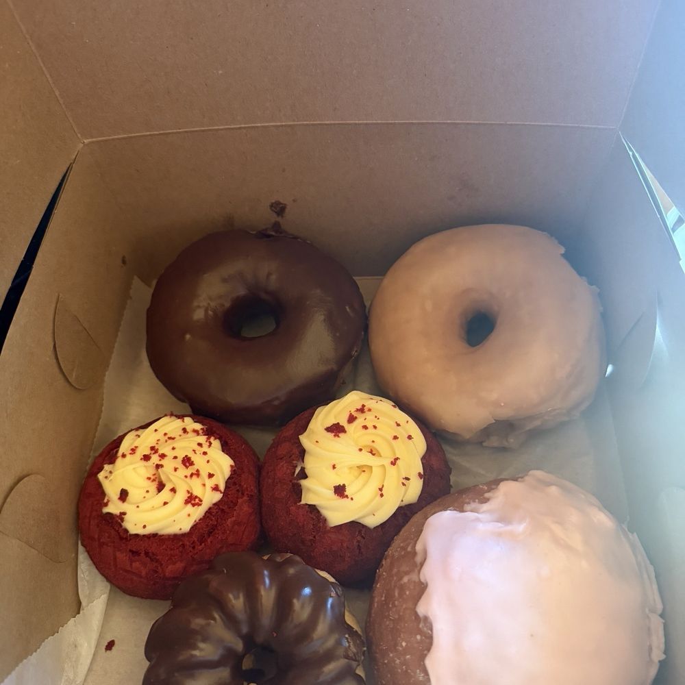 The Donut Man - Glendora - Chocolate glazed, maple, glazed, red velvet, chocolate cruller , And the pink one is peanut butter and jelly - Donuts Near Me - Glendora, California The Donut Man - Glendora - Chocolate glazed, maple, glazed, red velvet, chocolate cruller , And the pink one is peanut butter and jelly - Donuts Near Me - Glendora, California