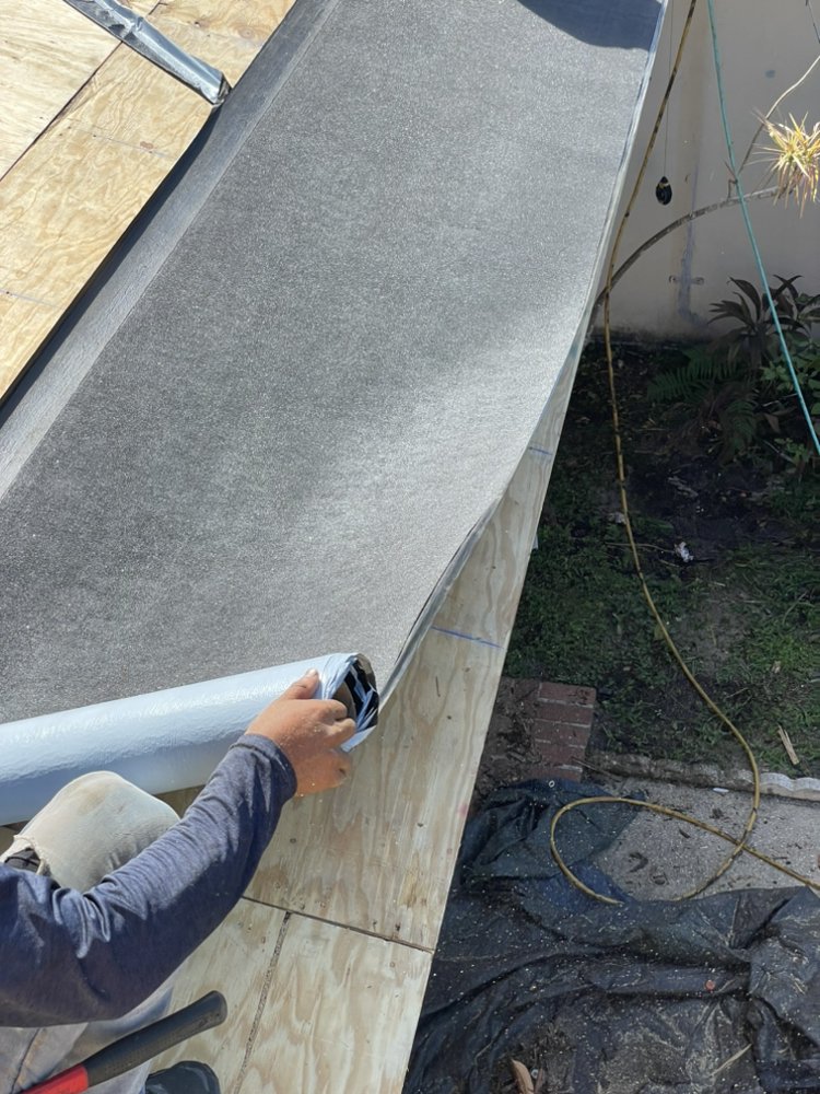 Slide of Clover Roofing