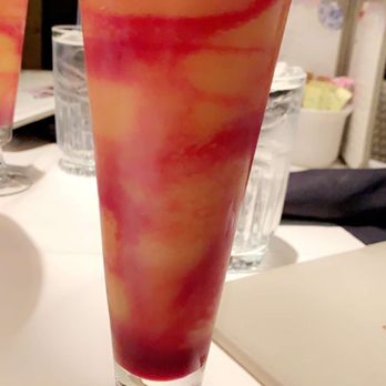 Grace's - Frozen mimosa with pomegranate swirl - American Near Me - Houston, Texas Grace's - Frozen mimosa with pomegranate swirl - American Near Me - Houston, Texas
