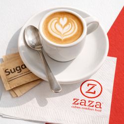 Zaza Cuban Comfort Food - Cafe con Leche: Strong Cuban espresso blended with milk and our house made creamita sugar.