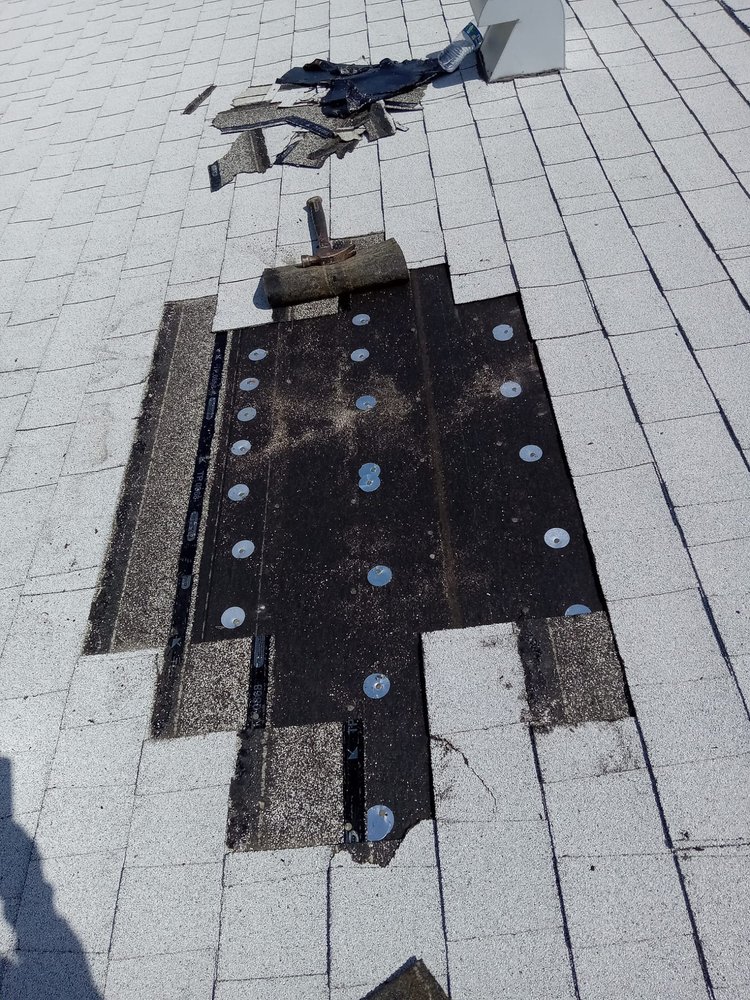 Slide of SGCI Roofing Division