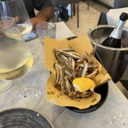 Osteria Pescheria - Fried sardines - so good.  The portion size is large so be ready to eat!