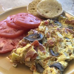 Custom veggie omelette w/ onions, 'shrooms, diced tomatoes and cheddar cheese.