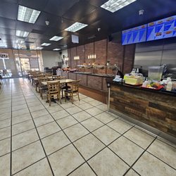 Tacos Los Carnales - Inside buffet set up. Fri-sun. Breakfast before 11. Lunch 11-4.  Lunch is $17